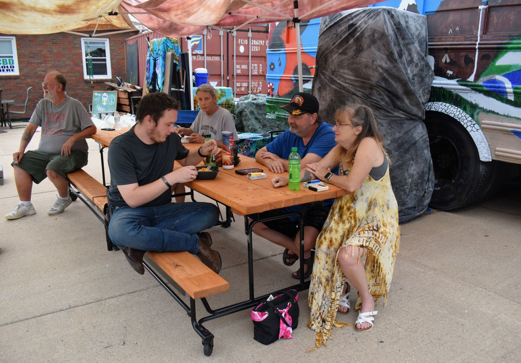 The Carr family enjoys dinner with the DeSalvos